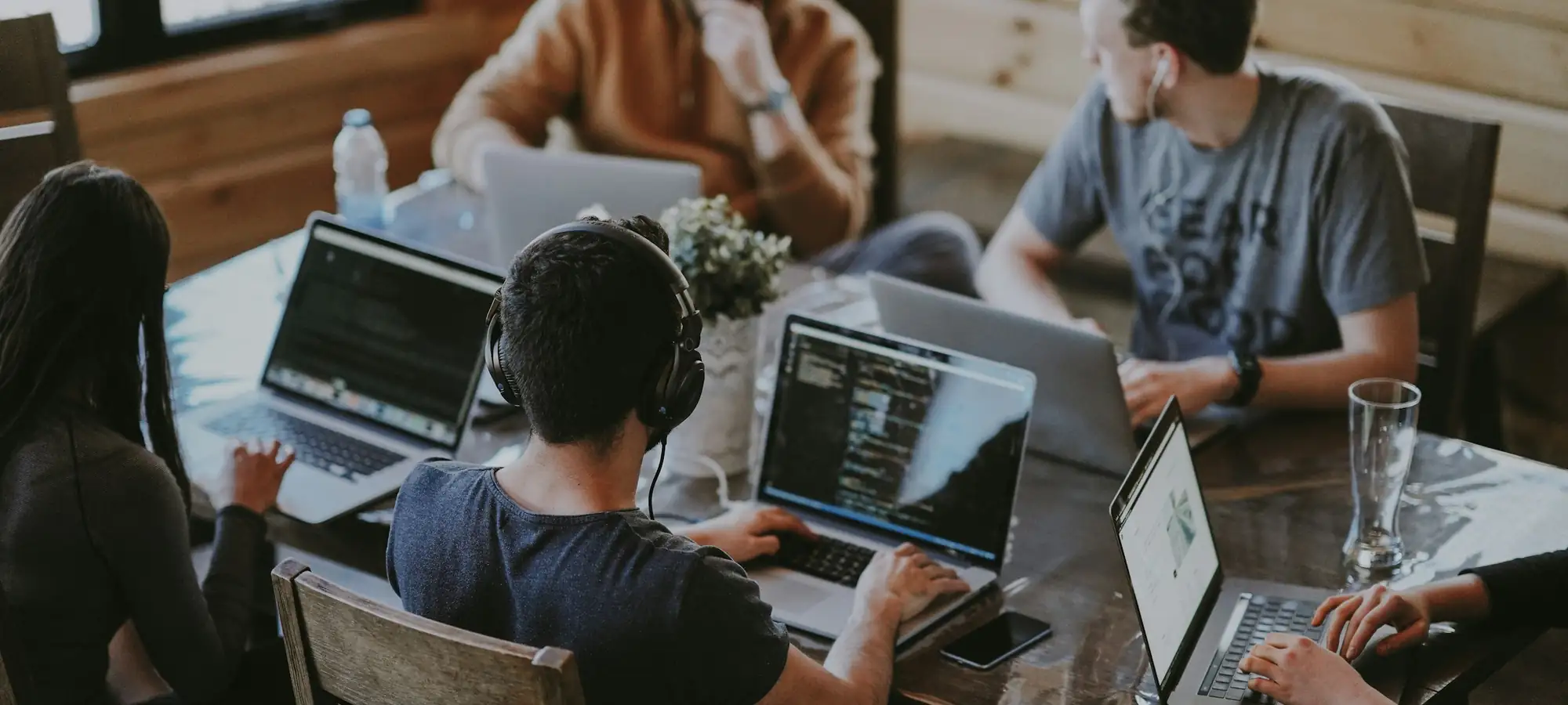 Colleagues collaborating in an open workspace