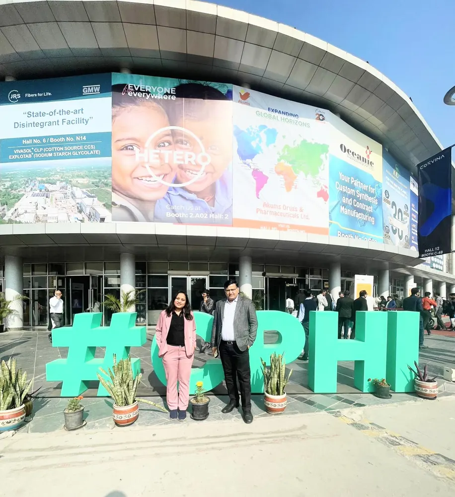 Team members in front of the CPHI lettering outside the exhibition venue